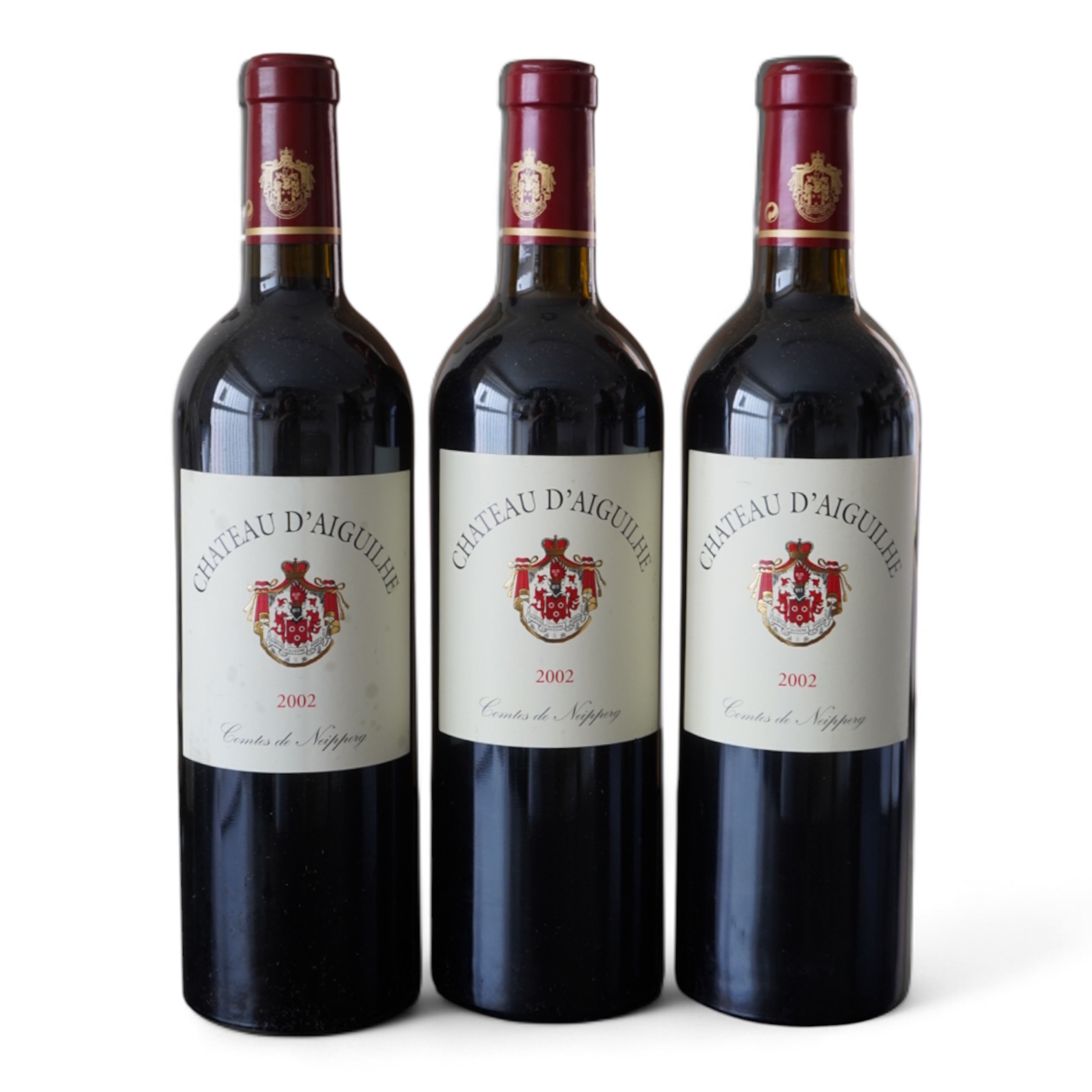 Nine bottles of 2002 Chateau d'Aiguilhe Castillon Cotes de Bordeaux, France